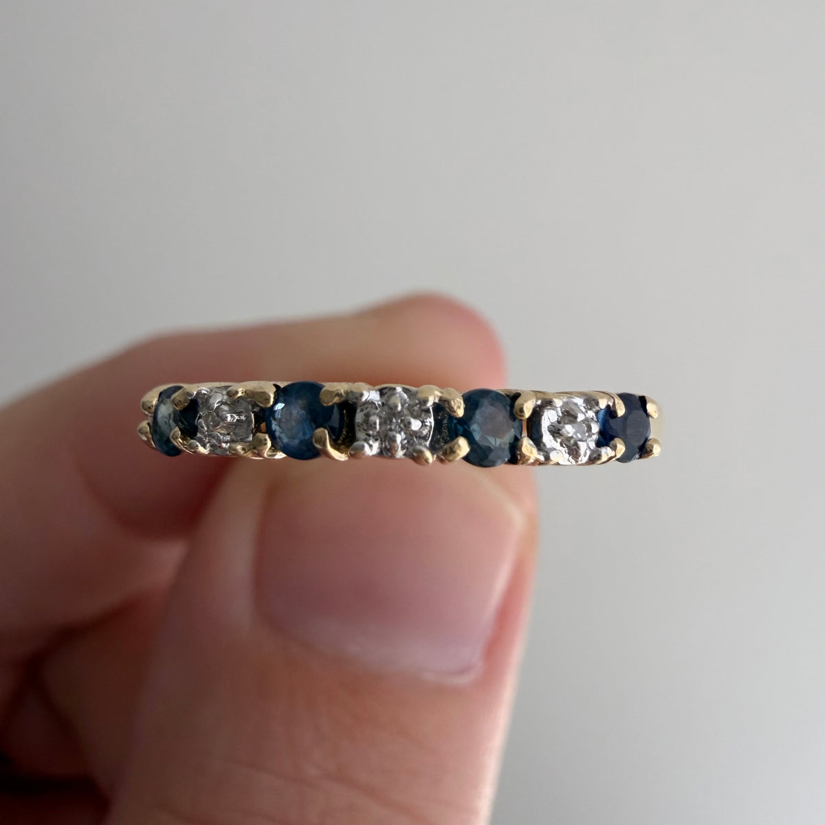 V I N T A G E // diverse blues / 10k half eternity band with topaz and diamonds / size 7.25