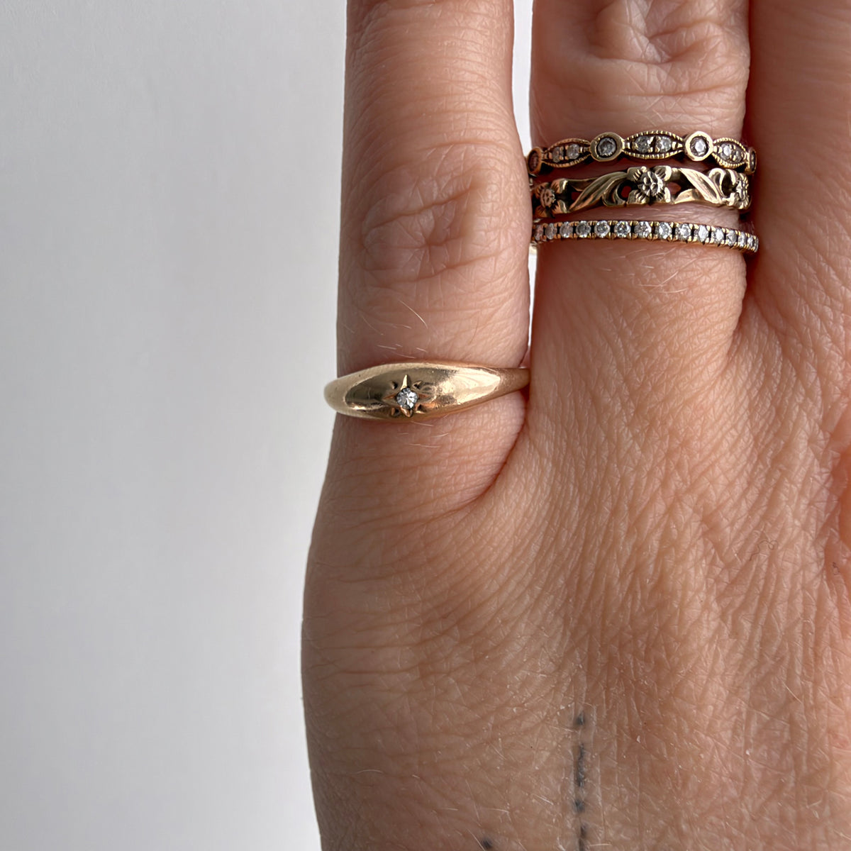 V I N T A G E // north star / 10k and diamond domed band / size 3.25