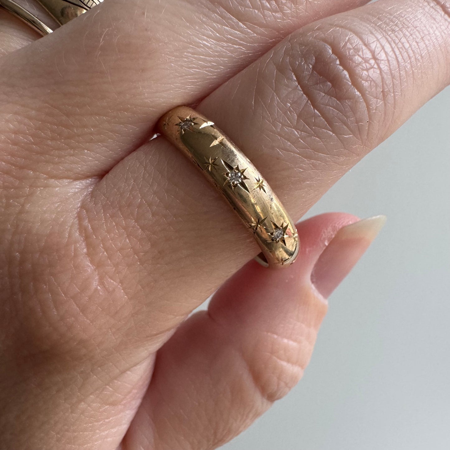 reimagined V I N T A G E // star story / 14k donut band with three new star-set diamonds and engraved starbursts / size 11 to 11.5