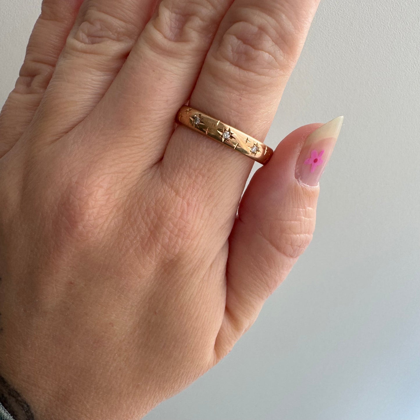 reimagined A N T I Q U E // star story / 14k donut band with three new star-set diamonds and engraved starbursts / size 10